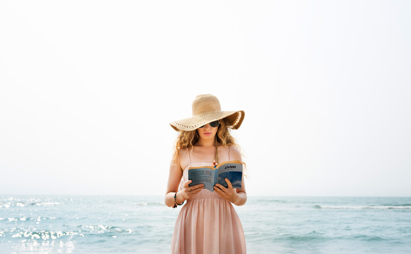Beach Summer Holiday Vacation Traveling Relaxation Reading Concept